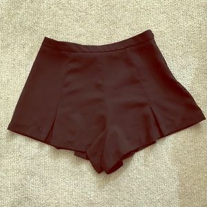 Black pleated dress shorts
